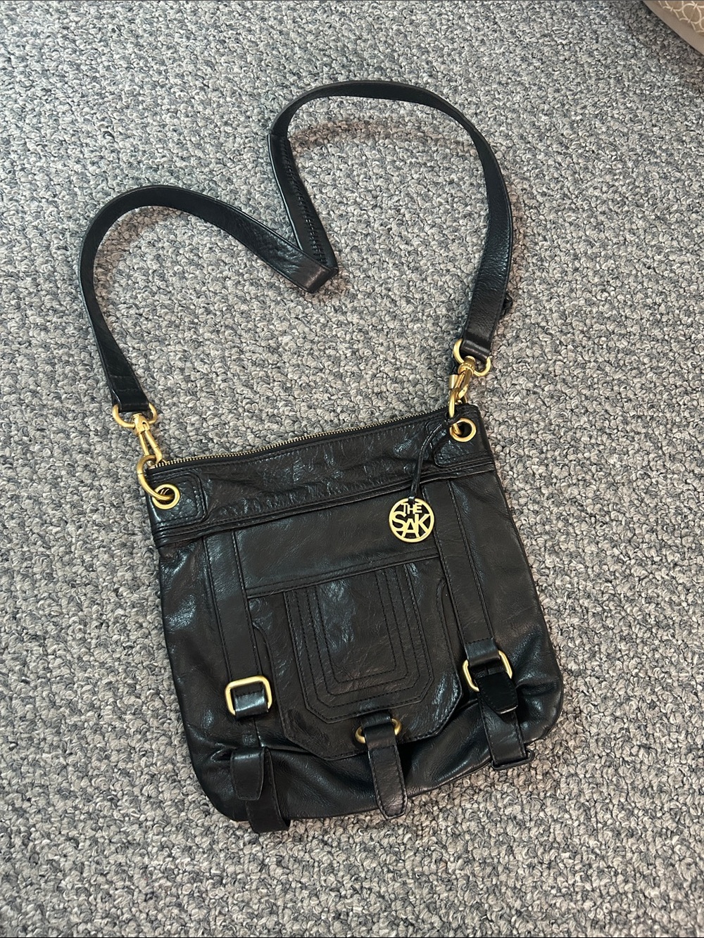The Sak Black Leather Shoulder Bag with Gold Hardware